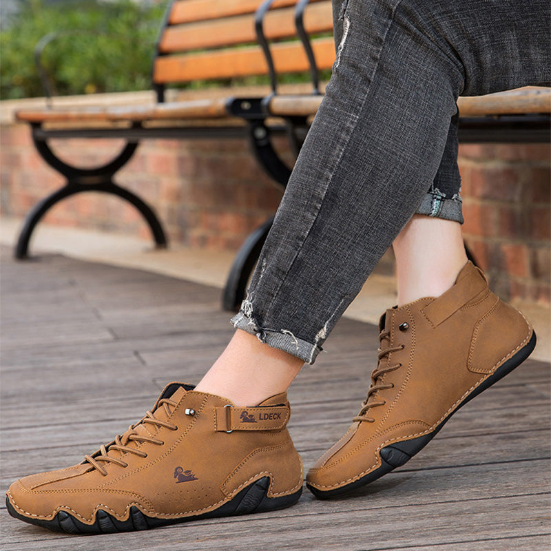 Sculpted Sole Boots: Distinctive Side Accent & Contoured Design