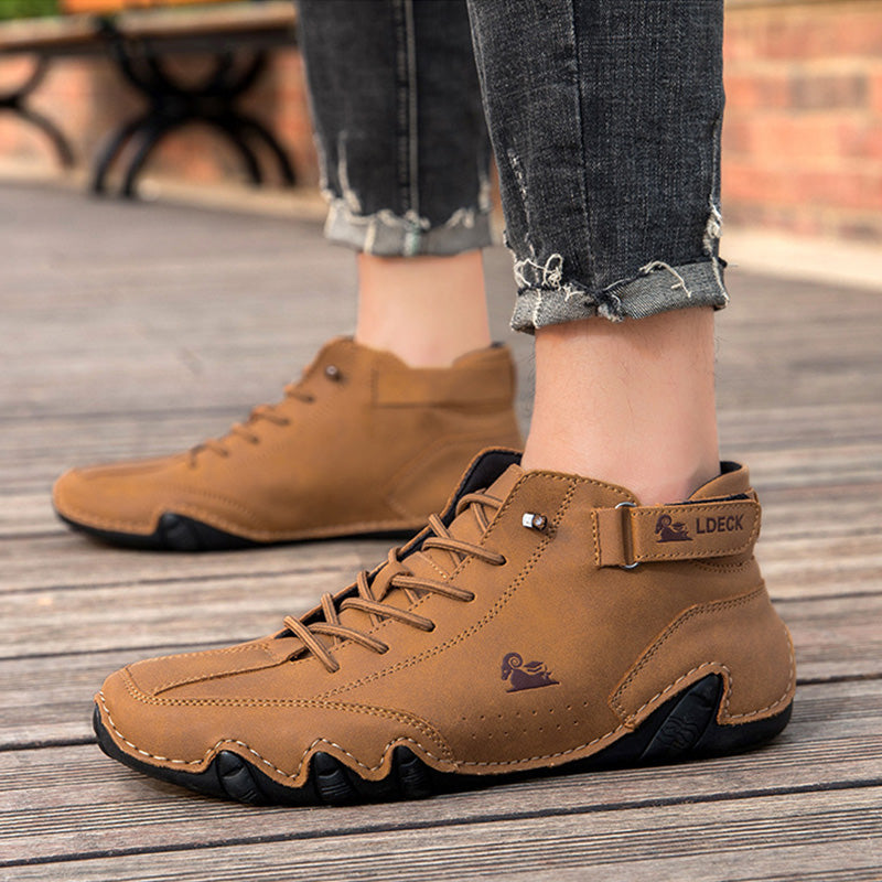 Sculpted Sole Boots: Distinctive Side Accent & Contoured Design