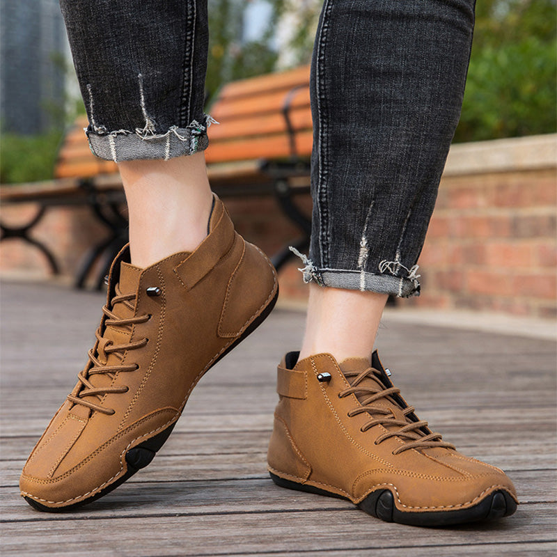 Sculpted Sole Boots: Distinctive Side Accent & Contoured Design