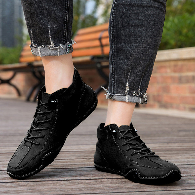 Sculpted Sole Boots: Distinctive Side Accent & Contoured Design