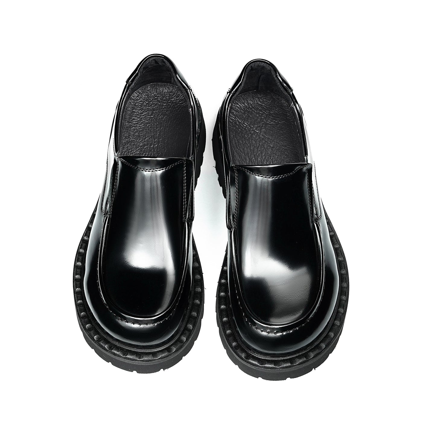 Men's Loafers: Sculpted Toe Design & Architectural Sole Definition