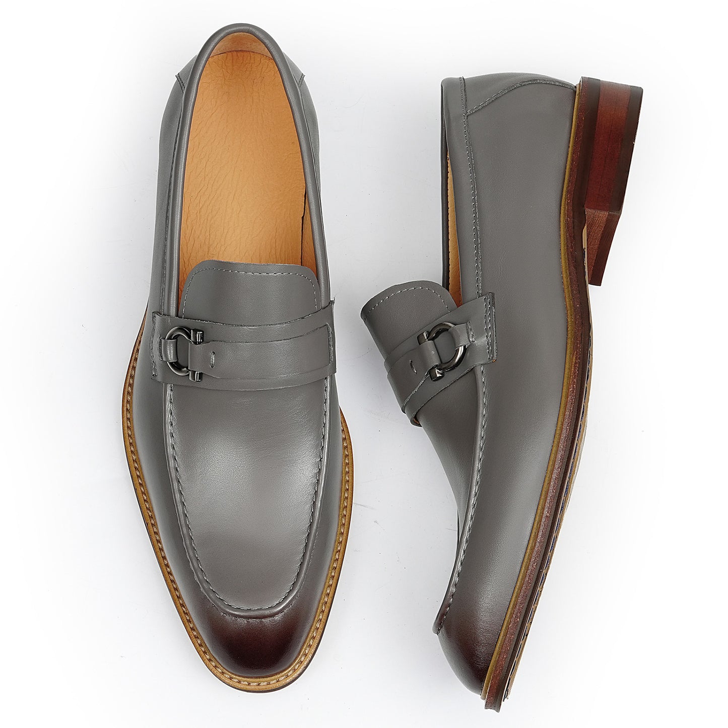 Men's Loafers with a Defining Buckle and Architectural Stitching